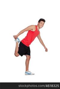 Muscular man stretching his legs after training isolated on a white background
