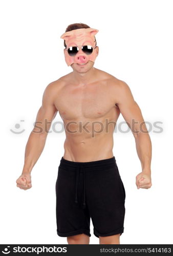 Muscular man with a pig mask on a white background