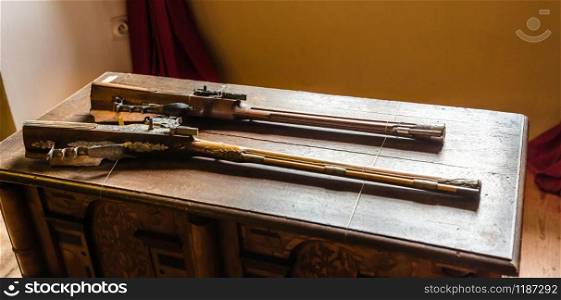 Museum with old guns, ancient armor storage, Europe. Medieval european weapons, famous places for travel and tourism