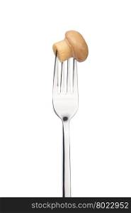 mushroom on a fork. mushroom on a fork. Isolated on a white background