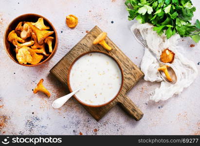 mushroom soup in bowl and on a table