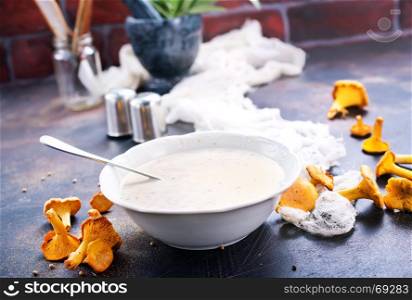 mushroom soup in bowl and on a table