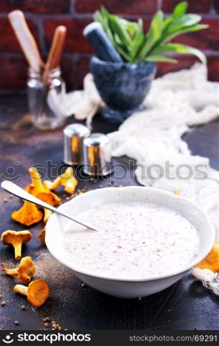 mushroom soup in bowl and on a table