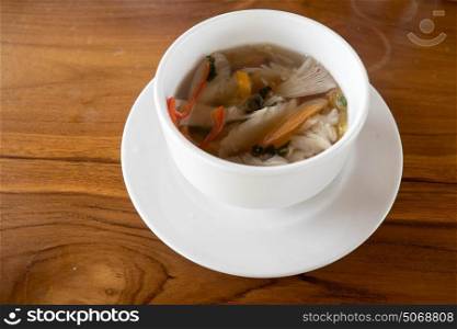 Mushroom soup served in a white bowl