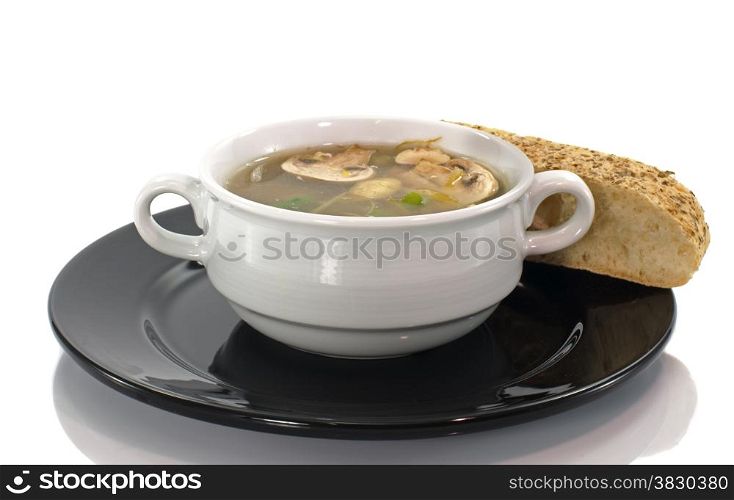 mushroom soup with piece of bread