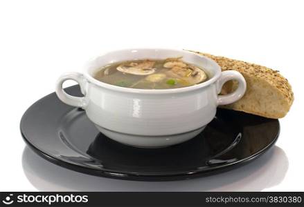 mushroom soup with piece of bread