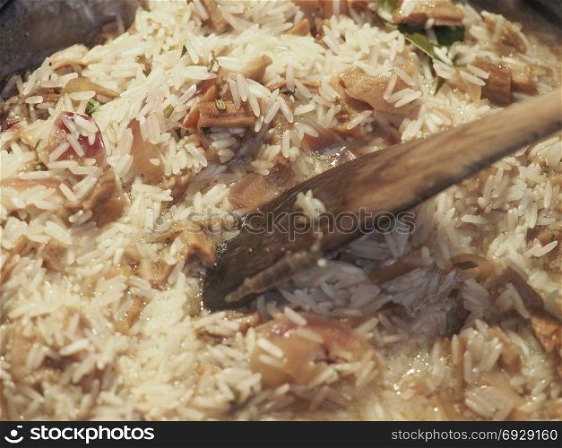 mushrooms risotto with basmati rice. porcino mushrooms risotto with basmati rice prepared traditional Italian cuisine dish