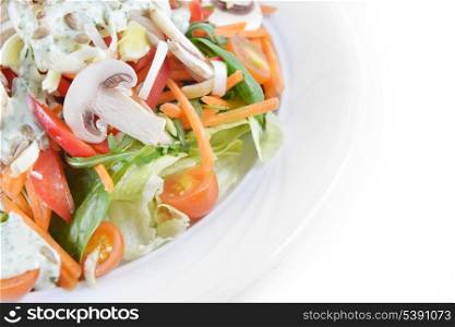 mushrooms salad with lettuce, cherry tomato and seeds