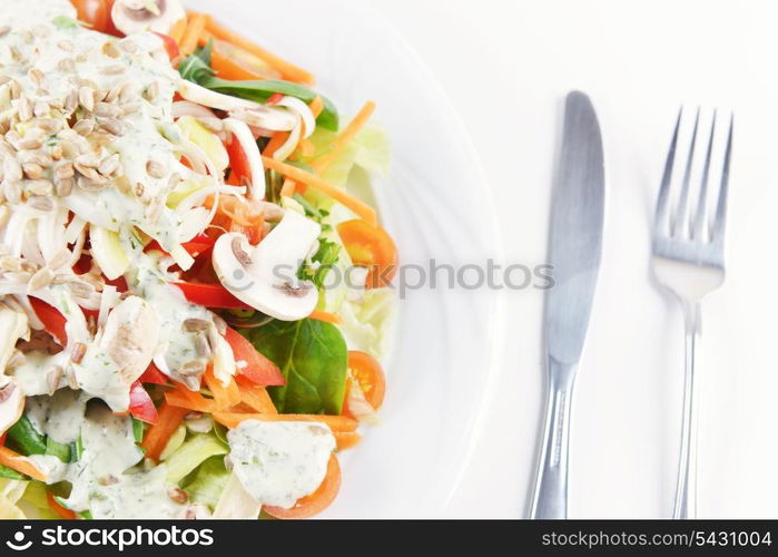 mushrooms salad with lettuce, cherry tomato and seeds