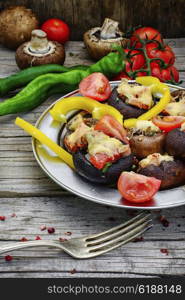 Mushrooms stuffed with cheese,tomatoes and green peppers