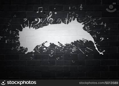 Music and drawing. Music notes and pencil on black background