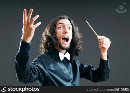 Music concept with passionate conductor