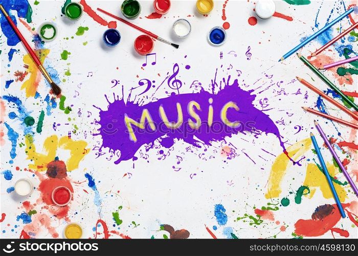 Music creative ideas. Music concept with paint spalshes on white paper