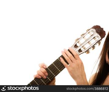 Musical instrument. girl holding acoustic guitar, female hands on fingerboard isolated on white background