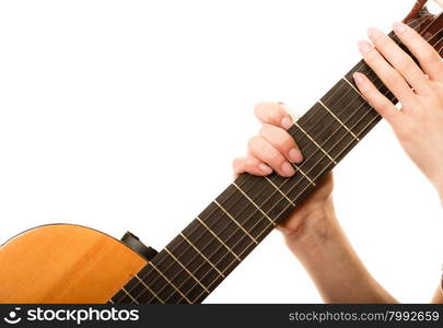 Musical instrument. girl holding acoustic guitar, female hands on fingerboard isolated on white background