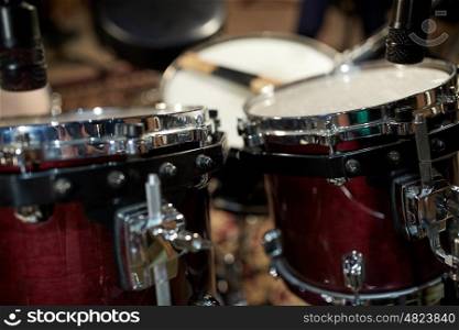 musical instruments and entertainment concept - drums at music studio. drums at music studio