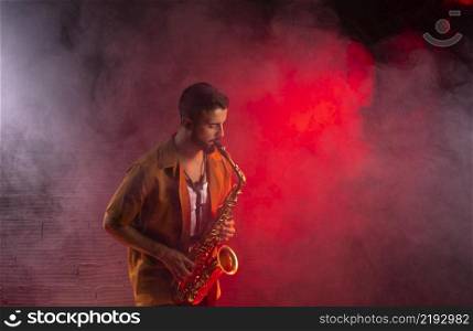 musician fog playing saxophone