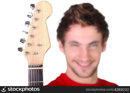 Musician holding electric guitar