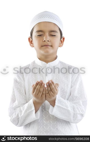 Muslim boy praying