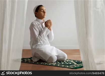 Muslim boy praying