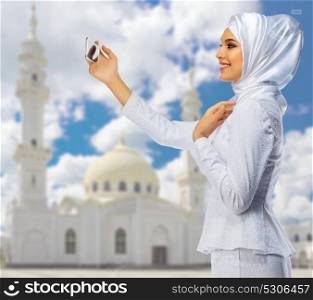 Muslim girl at mosque background
