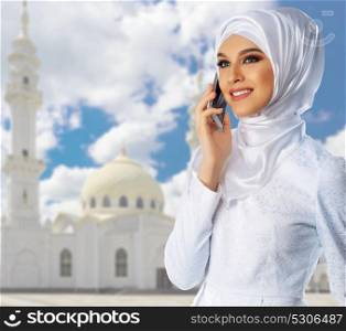 Muslim girl at mosque background