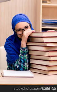 Muslim girl preparing for entry exams