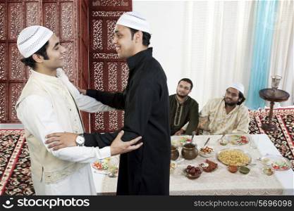 Muslim men greeting each other