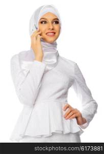 Muslim woman in white dress with mobile phone isolated