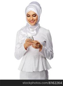 Muslim woman in white dress with phone isolated