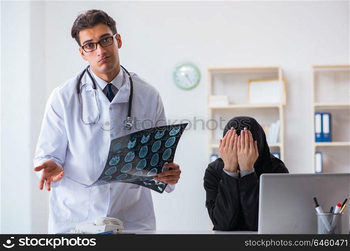Muslim woman visiting doctor for regular check-up