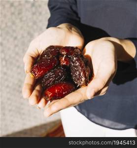 muslim woman with dates. High resolution photo. muslim woman with dates. High quality photo