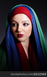 Muslim woman with headscarf in fashion concept