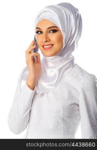 Muslim woman with mobile phone isolated