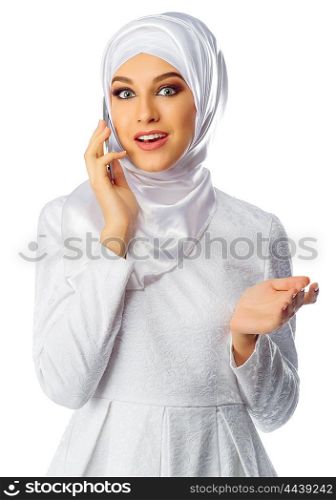 Muslim woman with mobile phone isolated