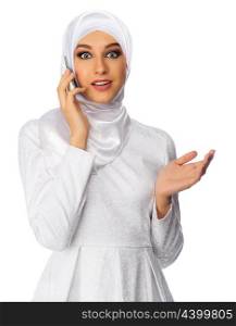 Muslim woman with mobile phone isolated on white