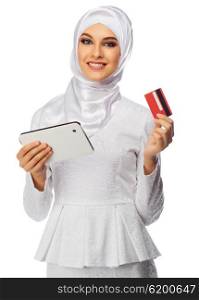 Muslim woman with tablet PC and card isolated
