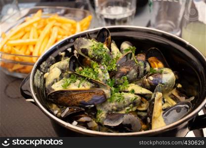 mussel and french fries at the restaurant