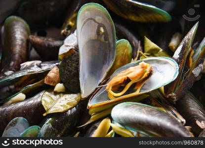 Mussels with herbs in hot pot cooked green mussel steaming seafood