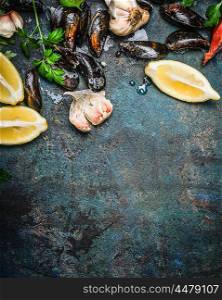mussels with lemon and ingredients for cooking , top view, place for text. Seafood concept
