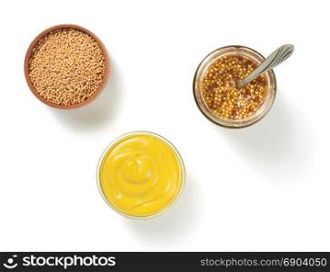 mustard sauce in bowl isolated on white background