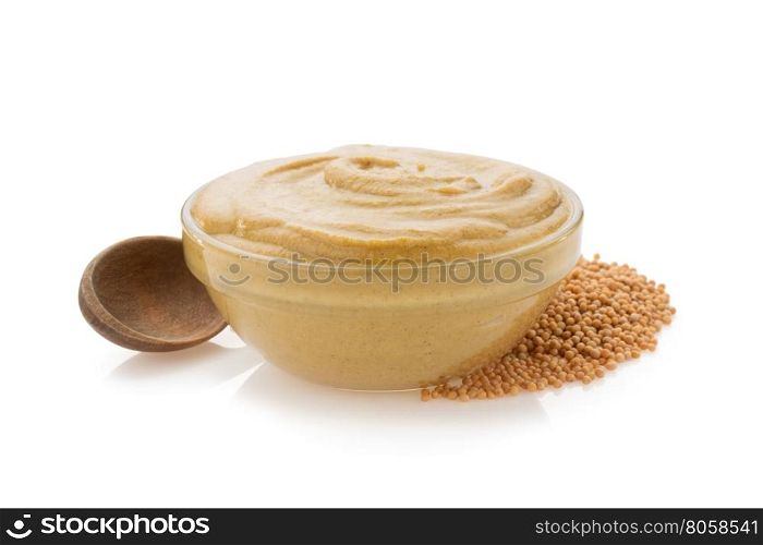 mustard sauce in bowl isolated on white background