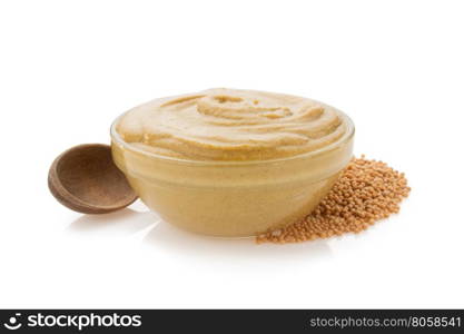 mustard sauce in bowl isolated on white background