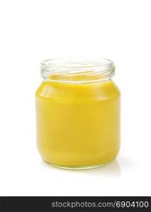 mustard sauce in jar isolated on white background