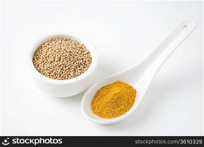 Mustard seeds and turmeric