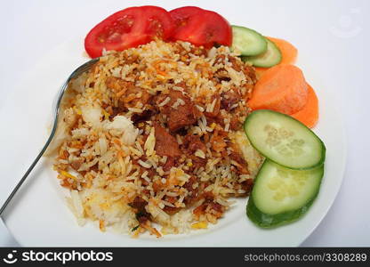 Mutton biriyani curry, with rice and salad