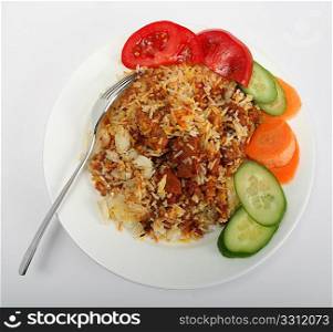 Mutton biriyani curry, with rice and salad