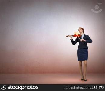 My business melody. Young businesswoman on colorful background playing violin