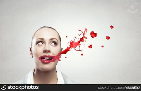 My favourite red pomade. Attractive woman applying red lipstick with brush