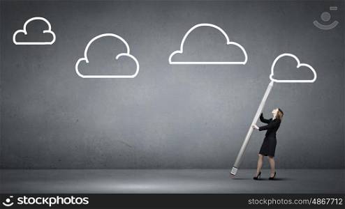 My great idea. Businesswoman drawing cloud in sky with huge pencil